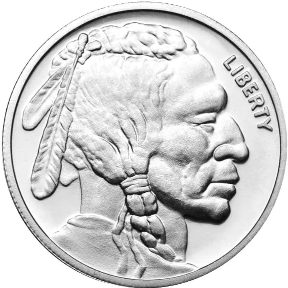 A silver coin with an indian head on it.