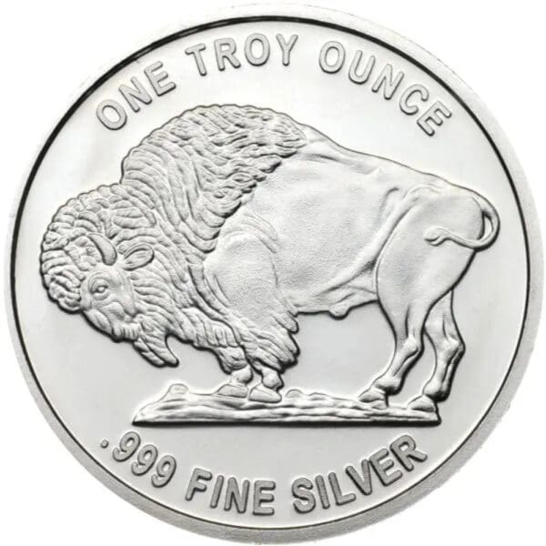 A silver coin with an image of a buffalo on it.